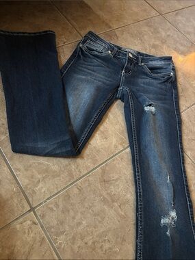 Women’s Dark Blue Bootcut Jeans with Distressed Details